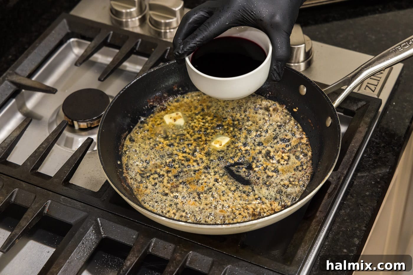 Marsala Veal: Italian Elegance 10 Marsala wine being poured into a skillet with melted butter and fragrant minced garlic