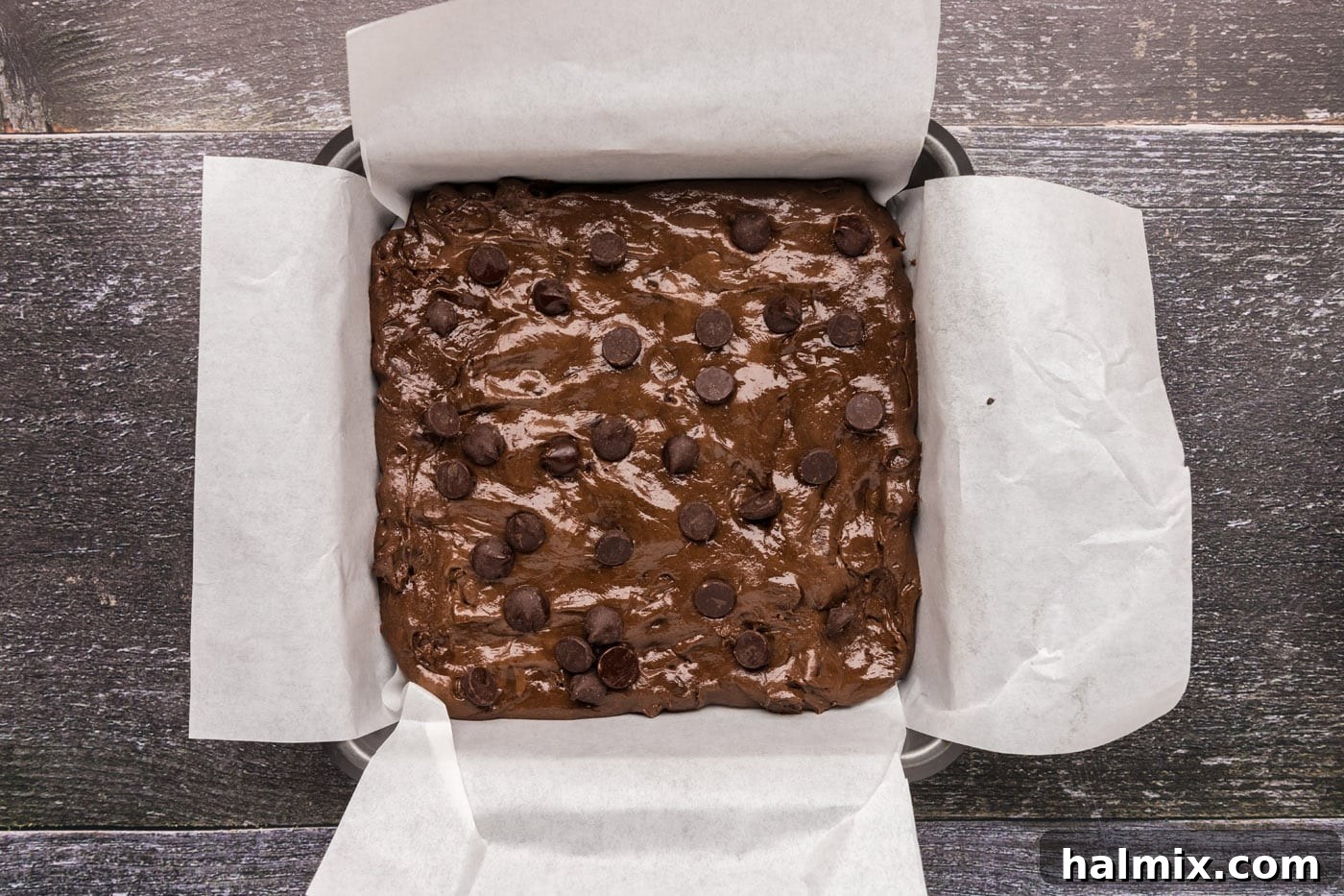 dark chocolate chips over brownie batter