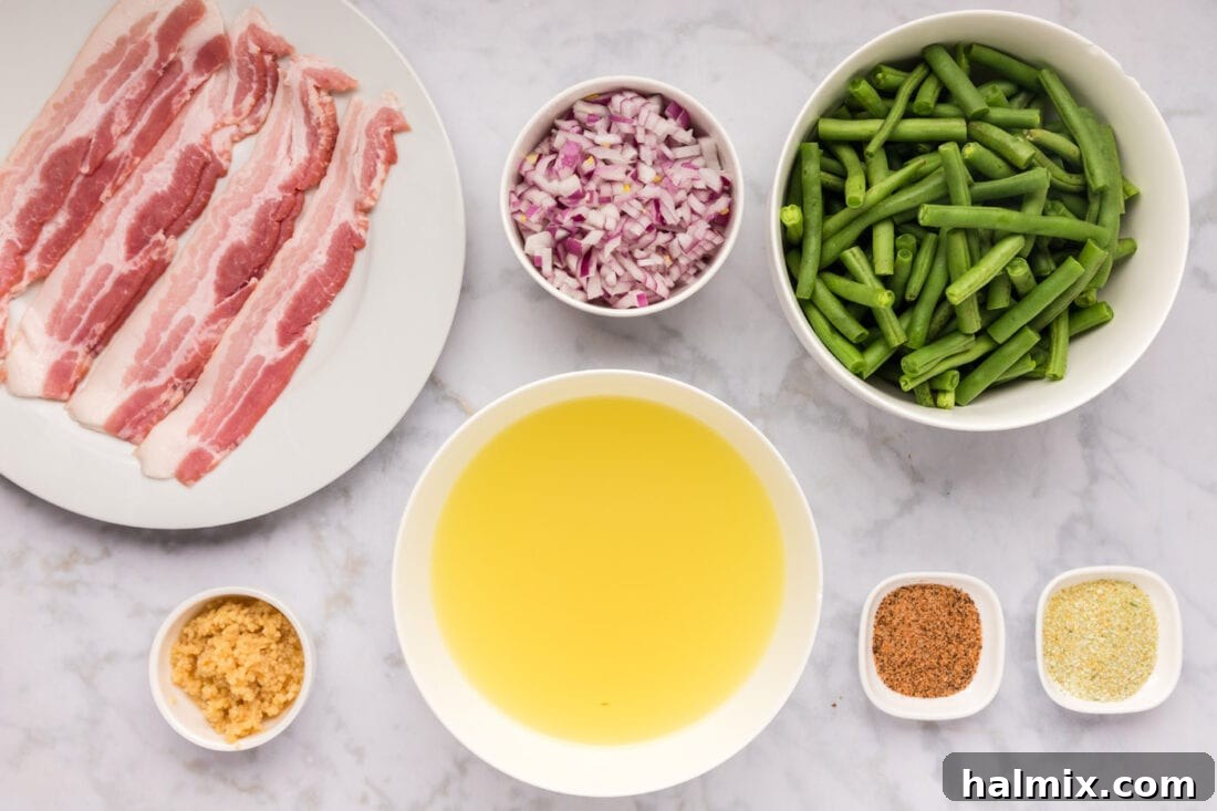 Old Fashioned Southern Green Beans 4 Fresh ingredients laid out for Southern Green Beans recipe including green beans, bacon, shallots, garlic, and seasoning