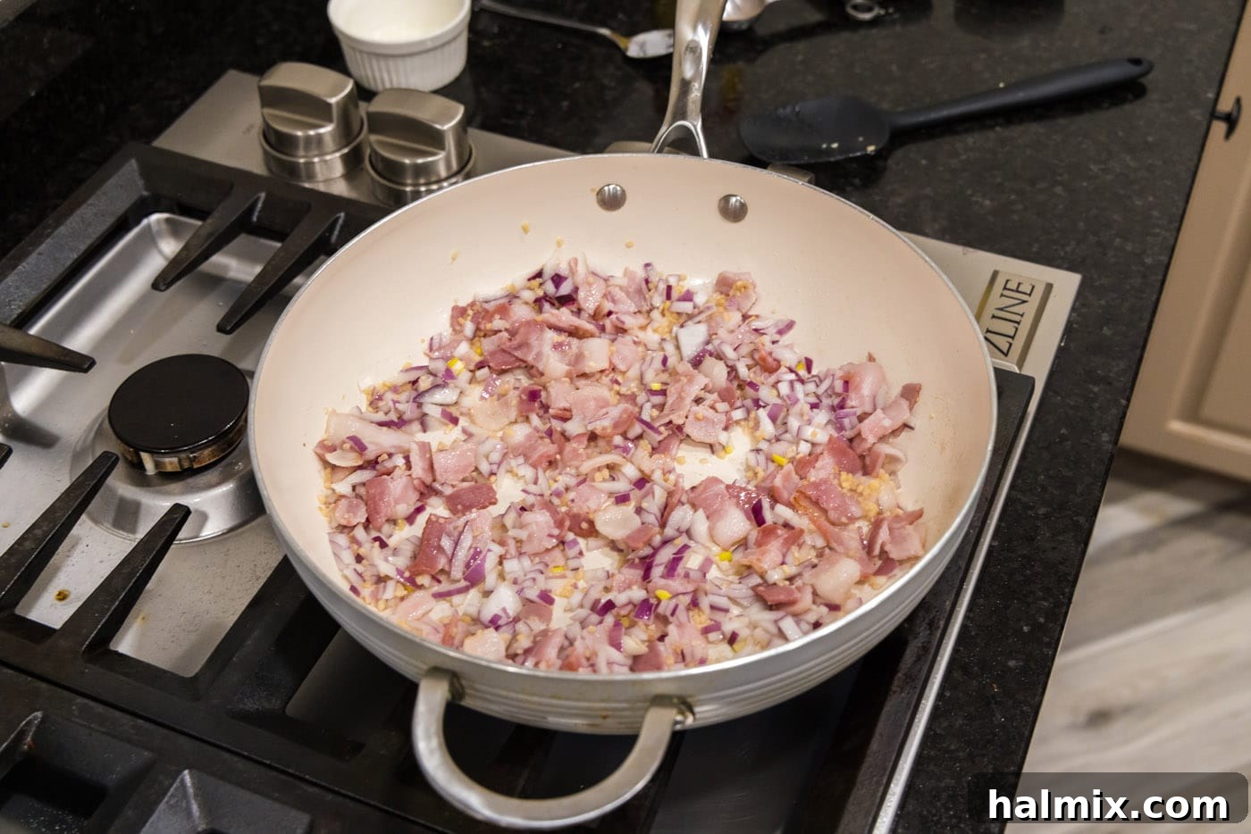 Old Fashioned Southern Green Beans 6 Shallots, garlic, and bacon cooking in a skillet, creating a flavorful base