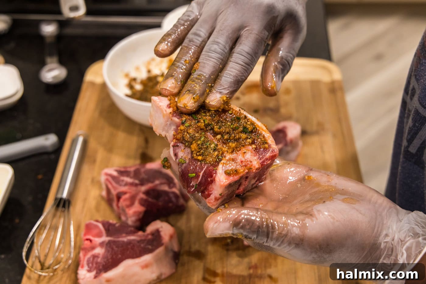 Chargrilled Lamb Loins 7 hand rubbing wet rub over lamb loin chops