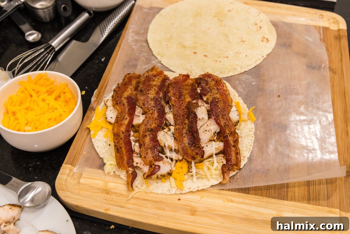 Crispy Ranch Chicken Bacon Quesadillas 11 Crispy bacon strips layered over the ranch, chicken, and cheese on a tortilla.