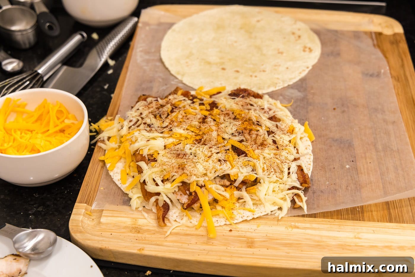 Crispy Ranch Chicken Bacon Quesadillas 13 A final sprinkle of chili powder over the top layer of cheese on the quesadilla filling.