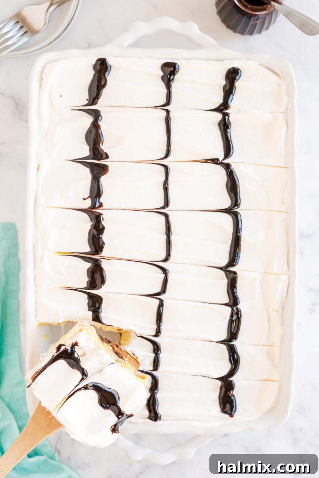 Chocolate Eclair Cloud Cake 15 over head view of pan of Cream Puff Chocolate Eclair Cake