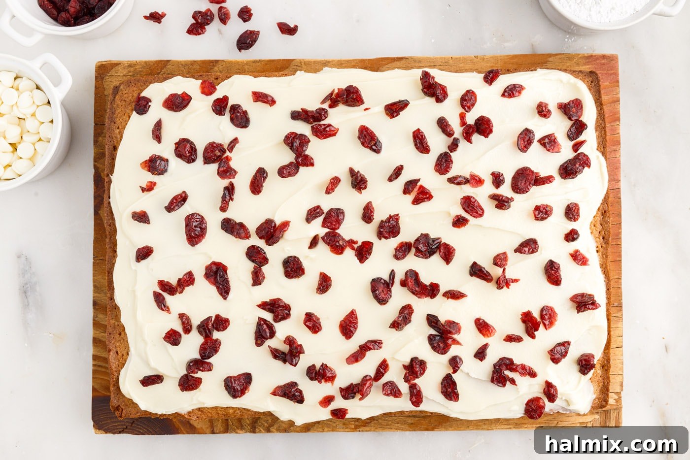 Tangy Cranberry Dream Bars 16 dried cranberries sprinkled over white chocolate cream cheese frosted blondies