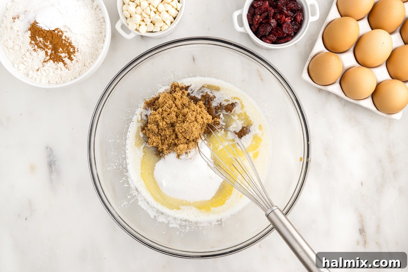 Tangy Cranberry Dream Bars 5 melted butter and sugars in a bowl with a whisk