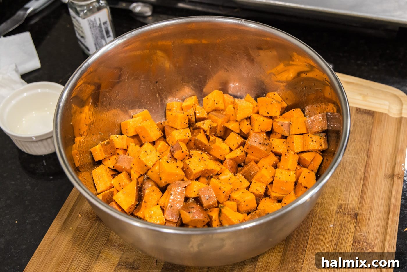 cubed sweet potatoes tossed in olive oil and seasonings
