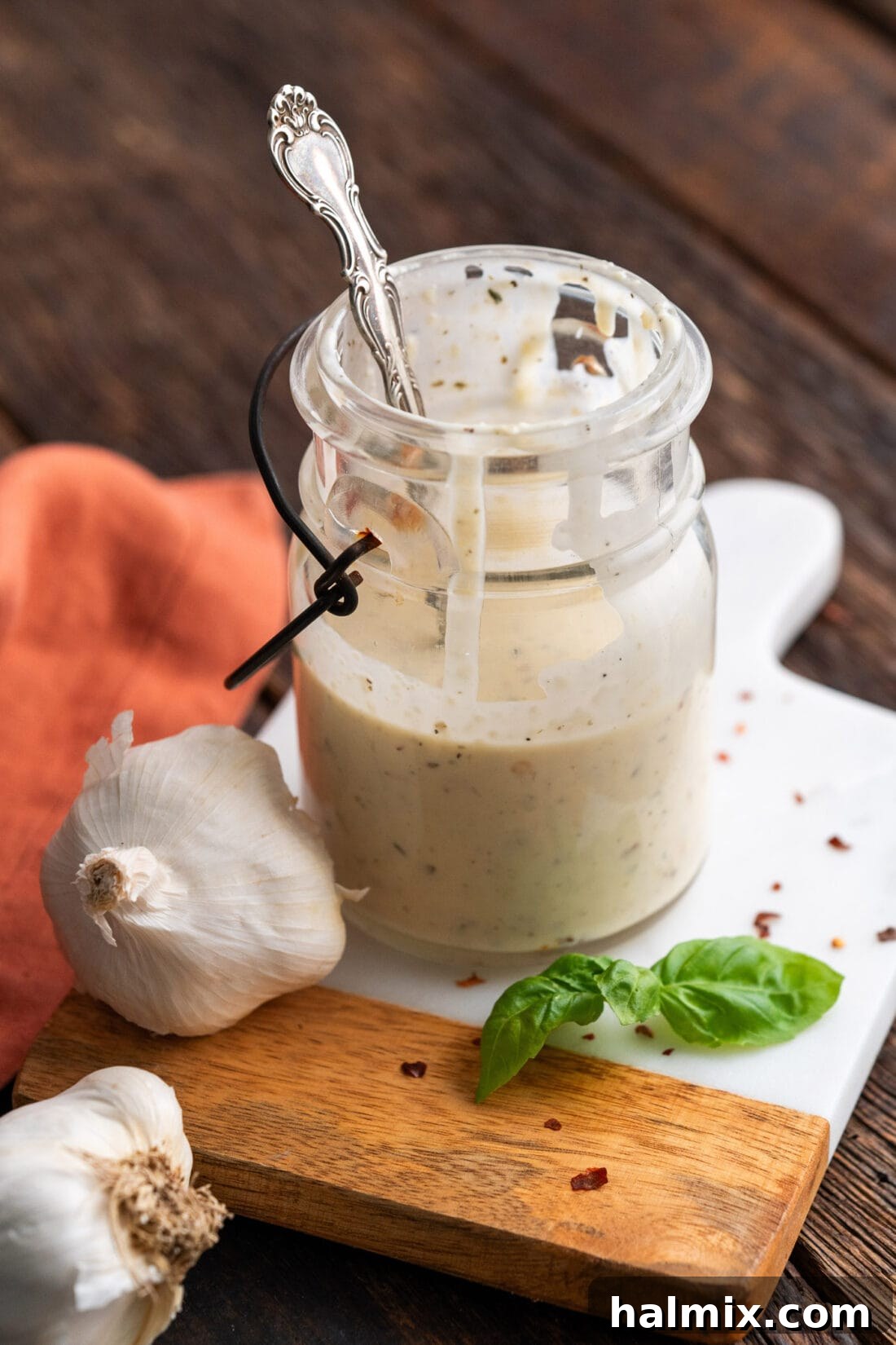 Jar of Homemade Garlic Parmesan Wing Sauce, brimming with flavor