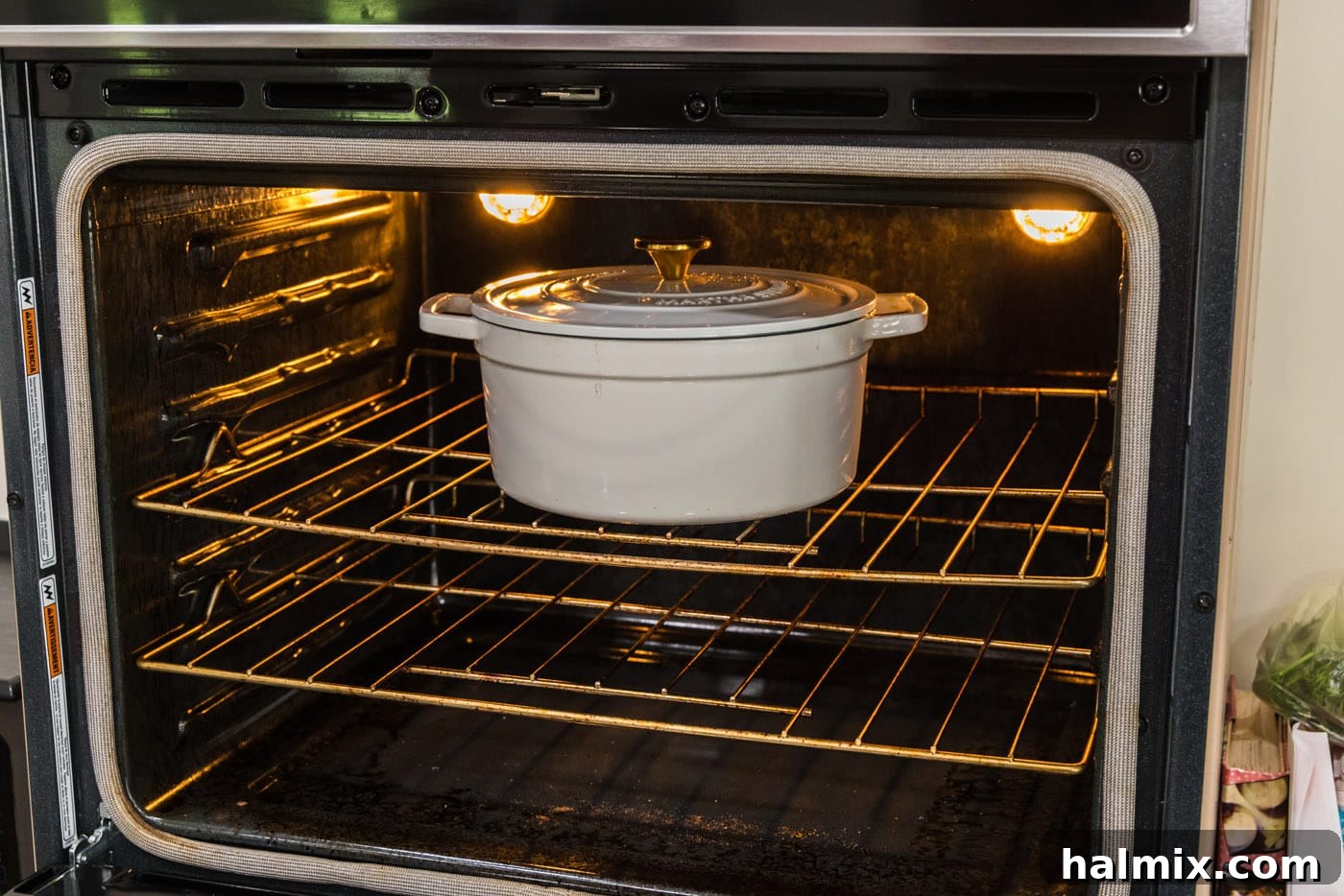 Fall-Off-The-Bone Short Ribs 16 The Dutch oven containing braised beef short ribs baking slowly in the oven.