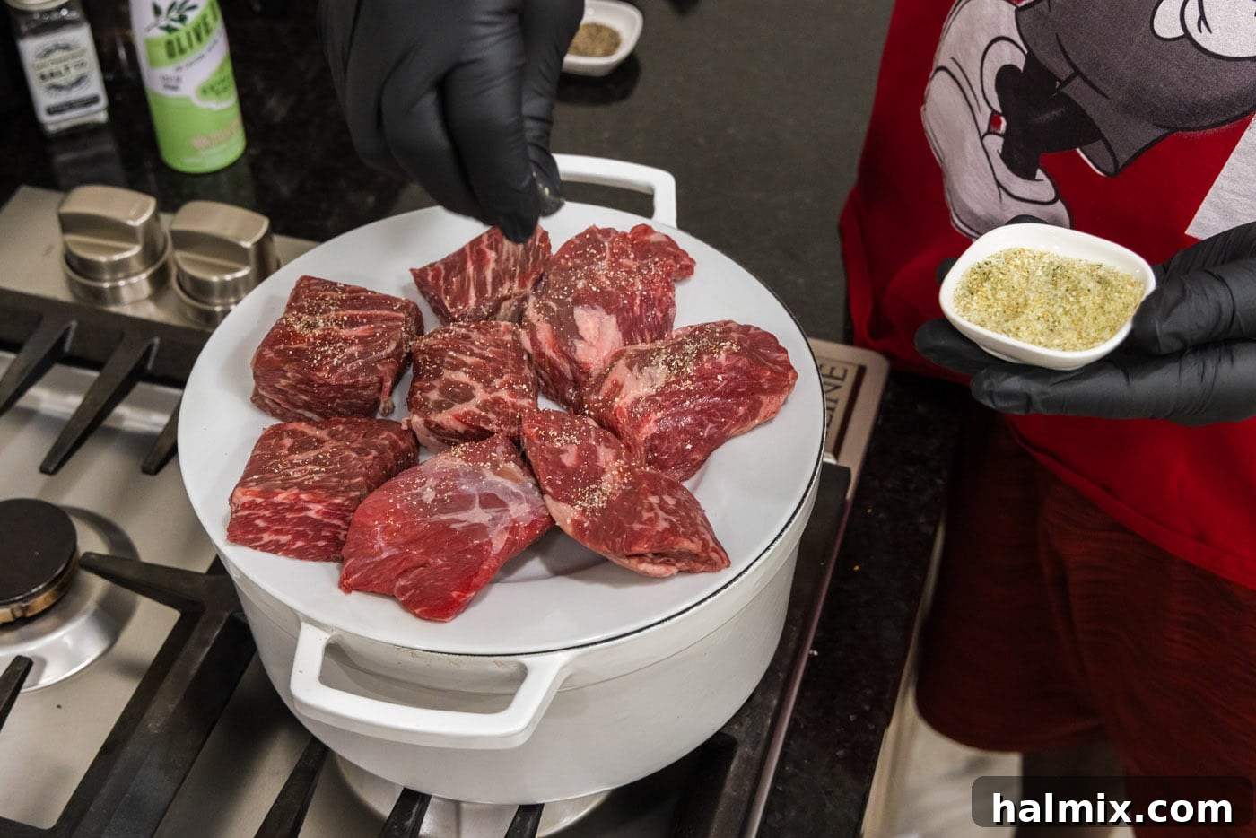 Fall-Off-The-Bone Short Ribs 5 Seasoning beef short ribs with salt and pepper evenly before cooking.