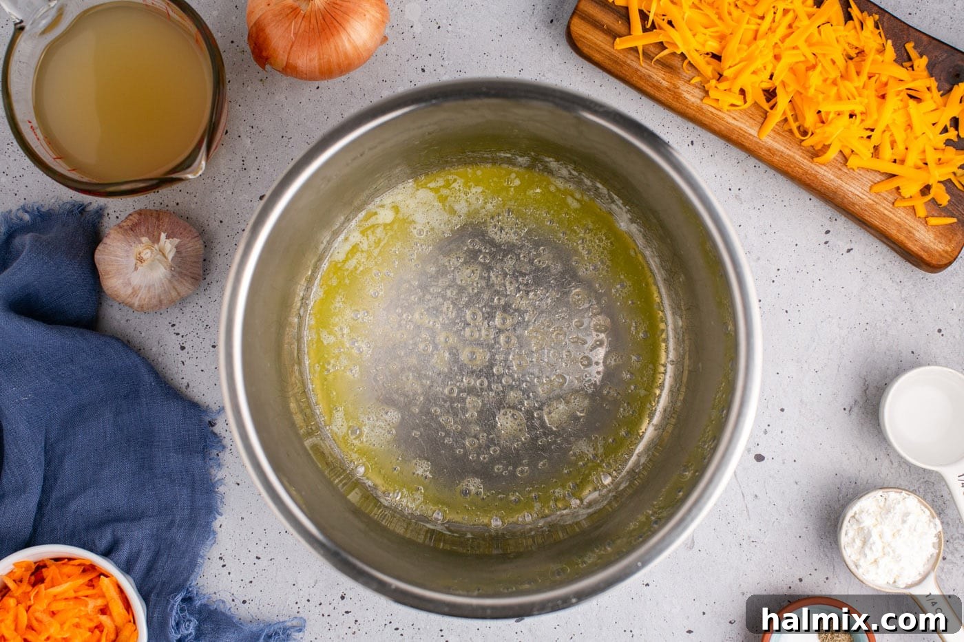 Golden Instant Pot Broccoli Cheddar Soup 5 Melted butter in the Instant Pot liner, ready for aromatics