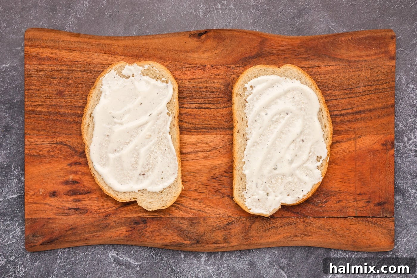 Fried Chicken Ranch Melt 5 Ranch dressing being spread on slices of rye bread