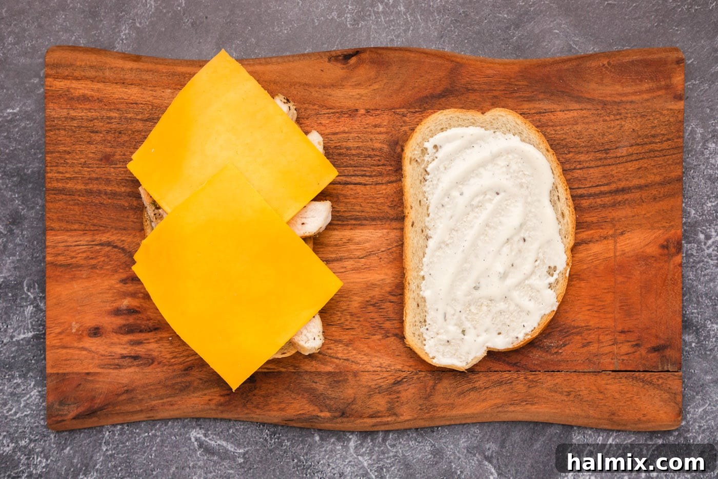 Fried Chicken Ranch Melt 7 Slices of cheddar cheese placed over sliced chicken breast and ranch dressing on bread