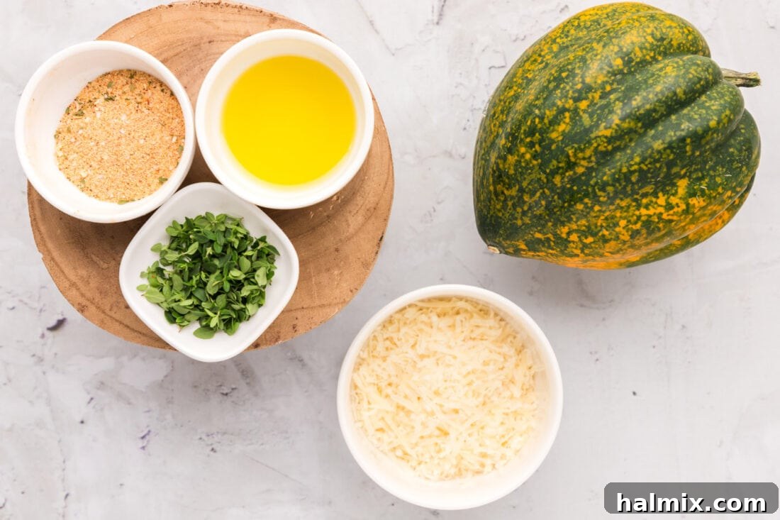 All ingredients for Air Fryer Acorn Squash laid out on a table, including squash, olive oil, seasonings, thyme, and parmesan.