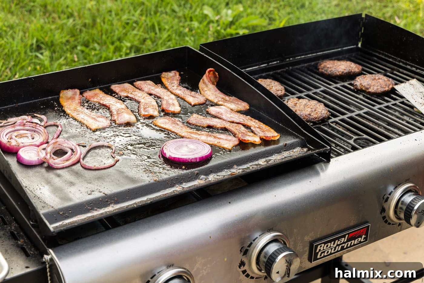 bacon and onion cooking on flat top grill, showing onions caramelizing in bacon grease.