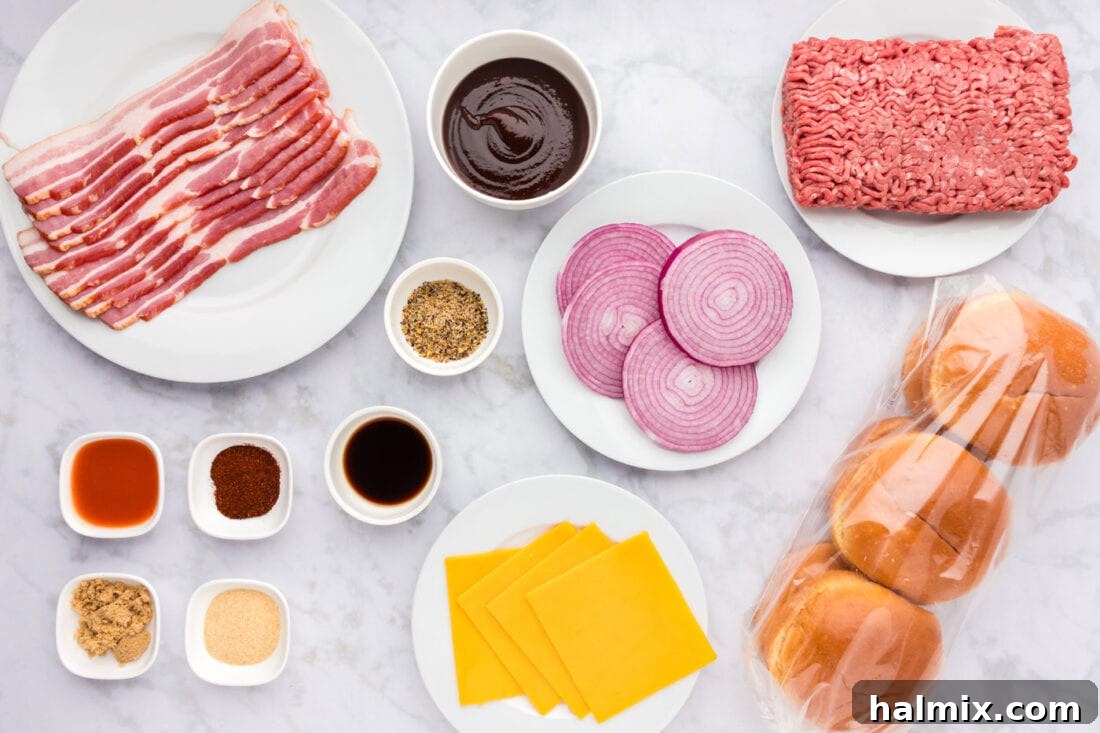 A flat lay image displaying all the fresh ingredients needed for BBQ Bacon Burgers, including ground beef, spices, bacon, onions, and cheese.