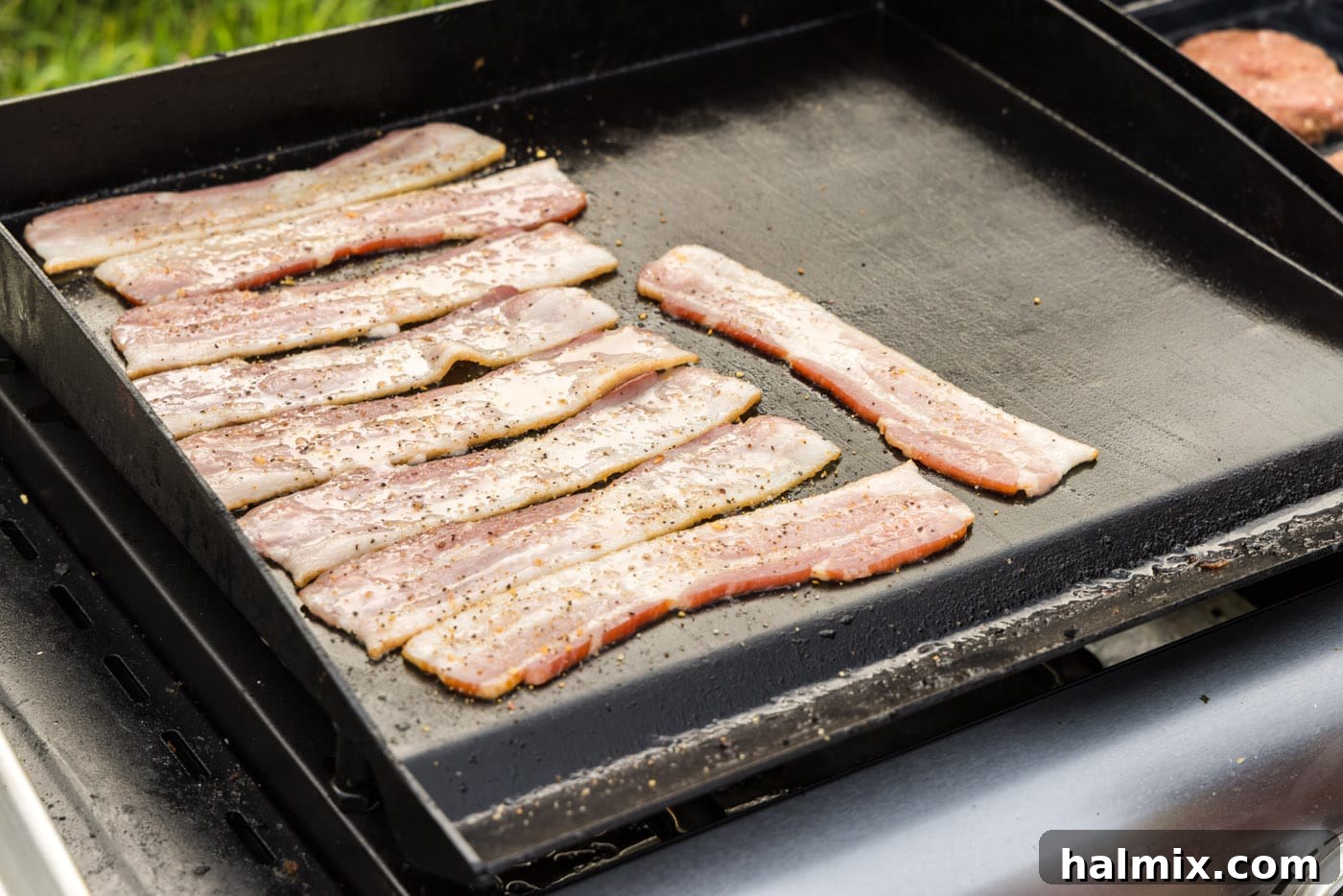cooking bacon on the grill, achieving perfect crispness.