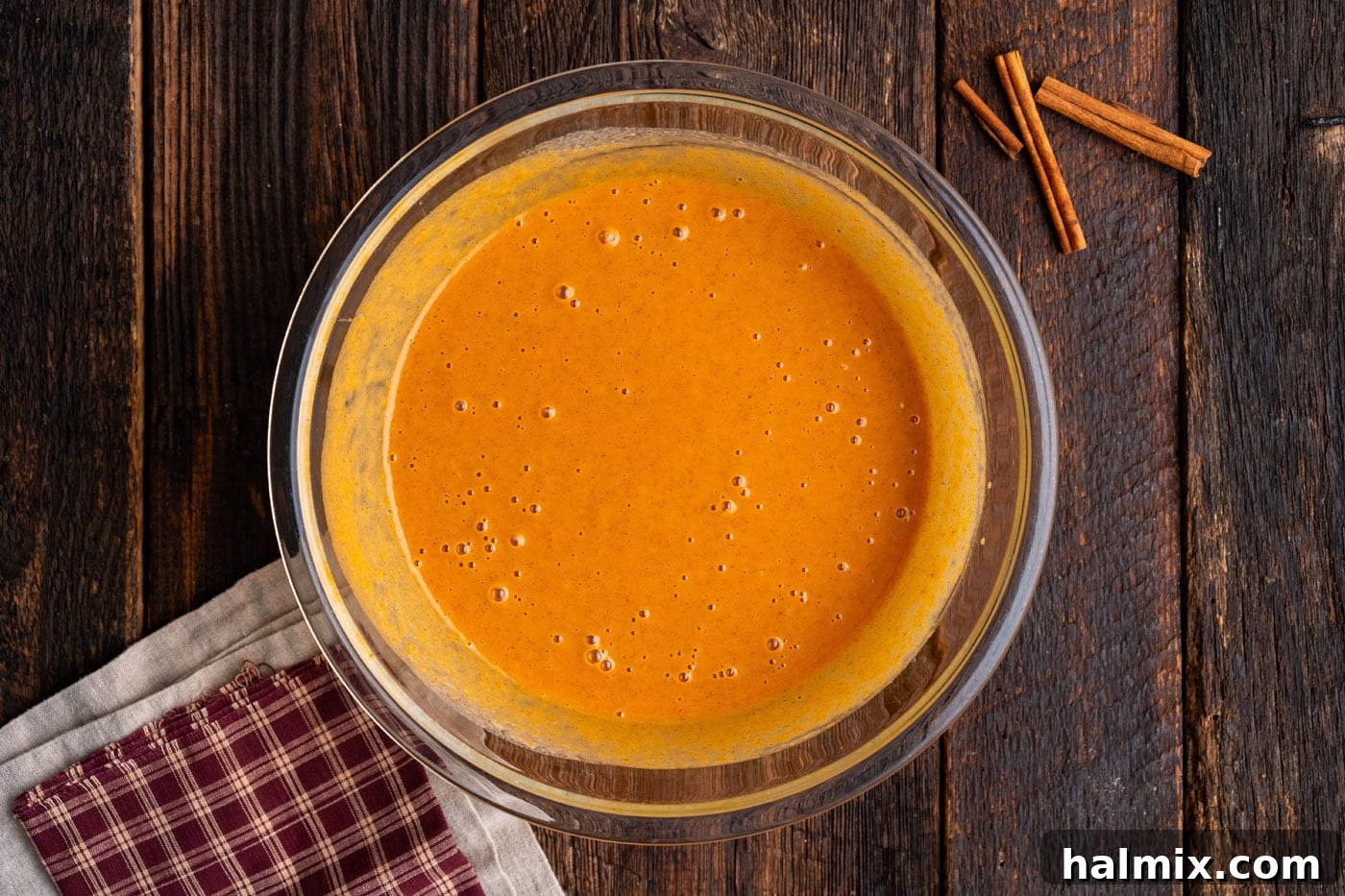 pumpkin dump cake mixture in a bowl