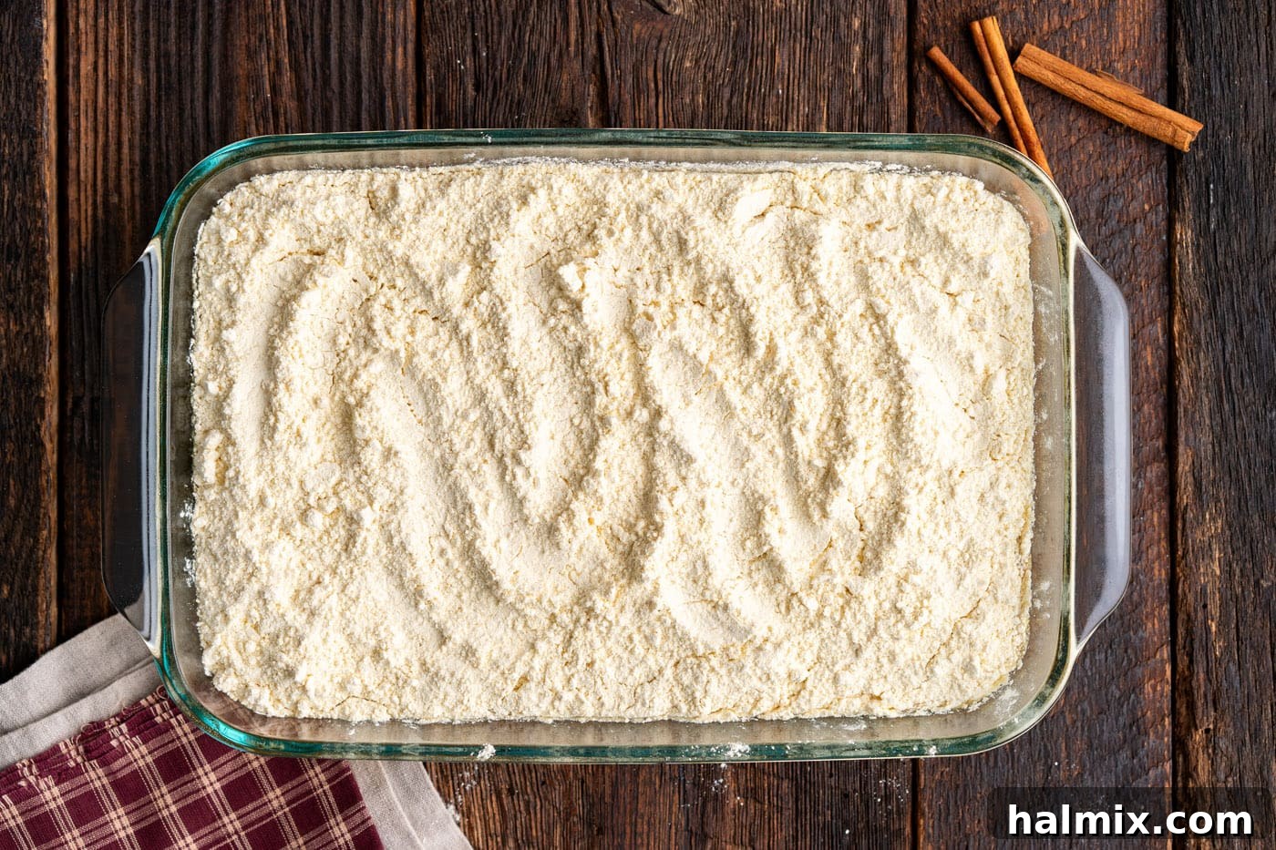 dry cake mix spread evenly over pumpkin batter