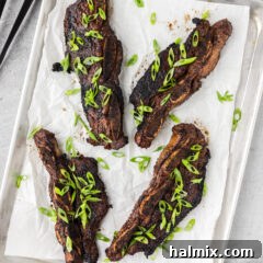 Korean Short Ribs on a sheet pan with parchment paper