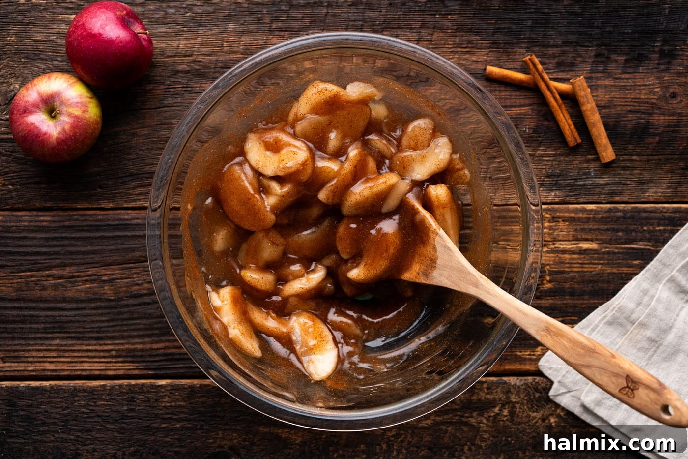 No-Fuss Caramel Apple Delight 7 apple pie filling in a bowl with a wooden spoon