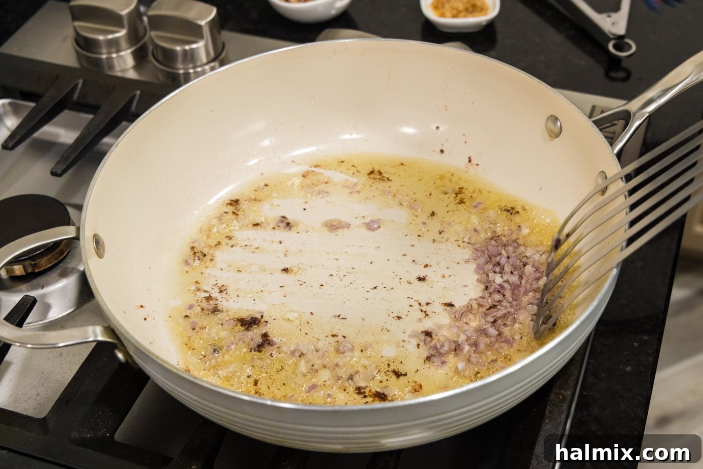 sauteeing minced shallots in the skillet with olive oil and bacon fat