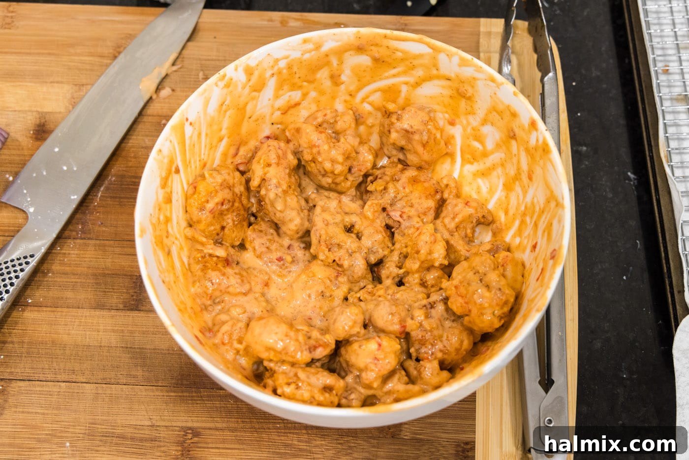 Electric Shrimp Bites 13 bang bang shrimp tossed in a bowl