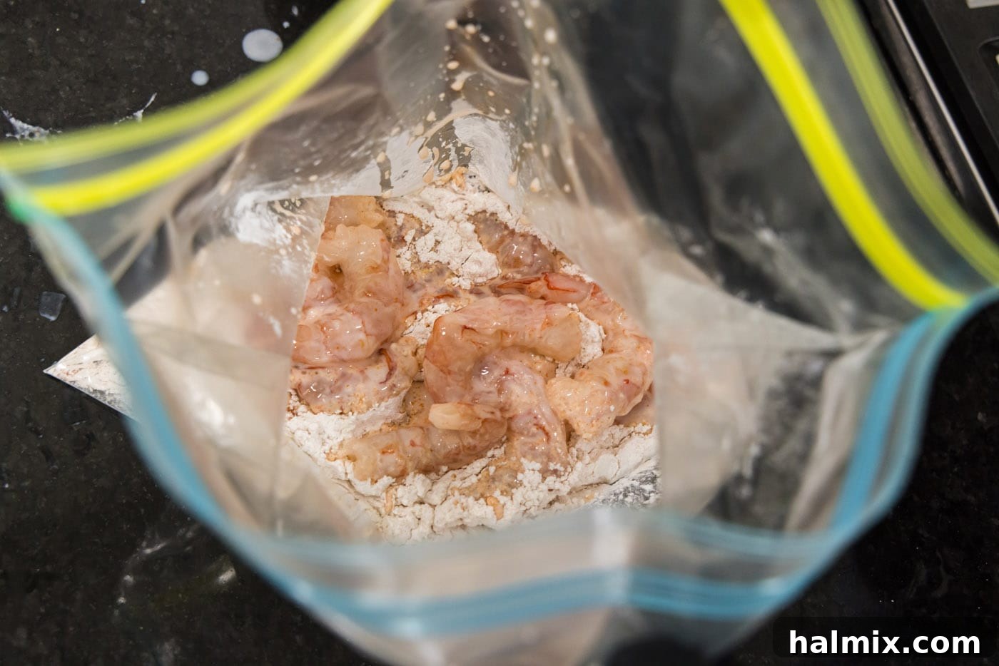 Electric Shrimp Bites 9 marinated shrimp added to flour in a large bag