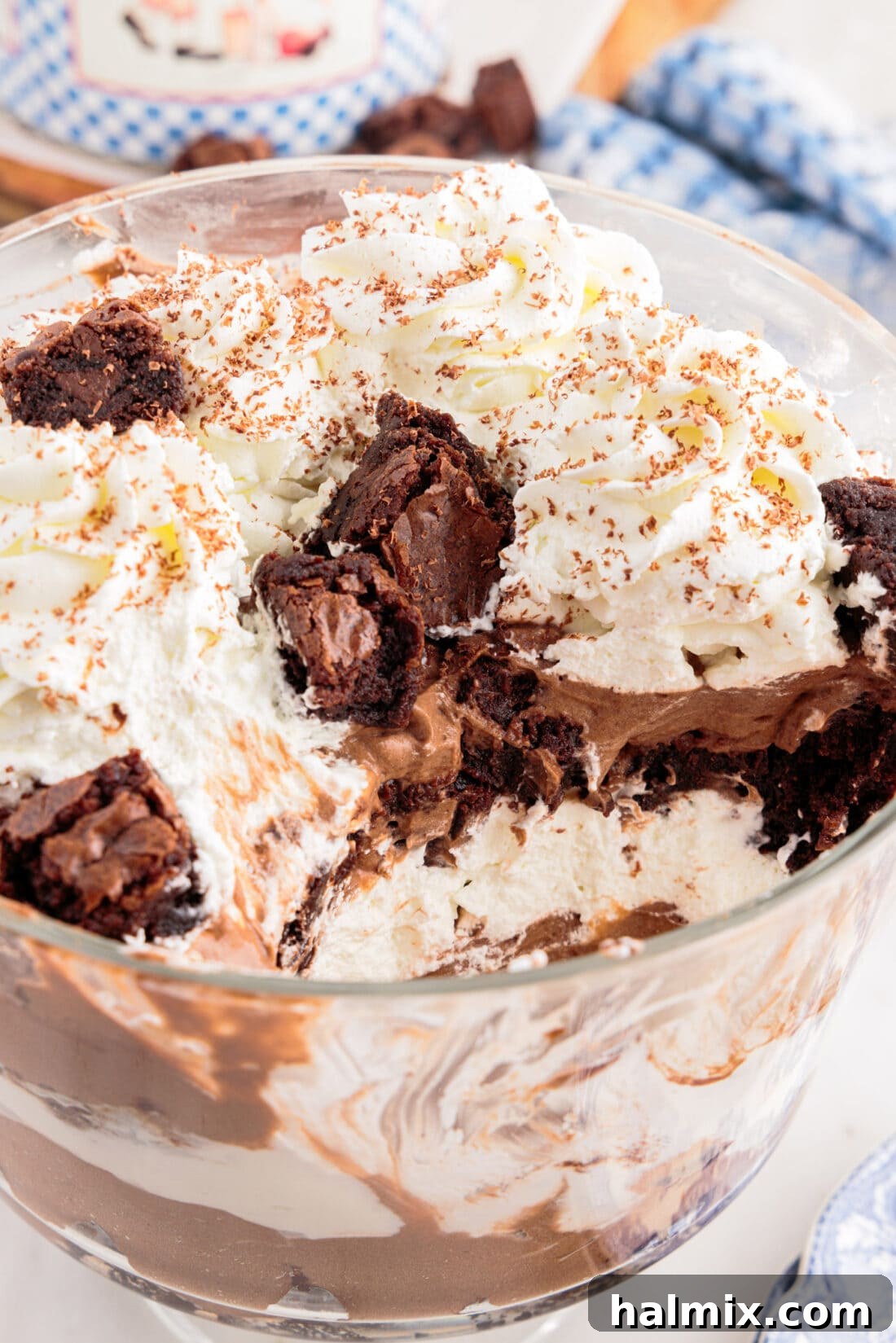 Ultimate Fudge Brownie Trifle 16 Close up photo of a Brownie Trifle with a portion removed, highlighting the layers