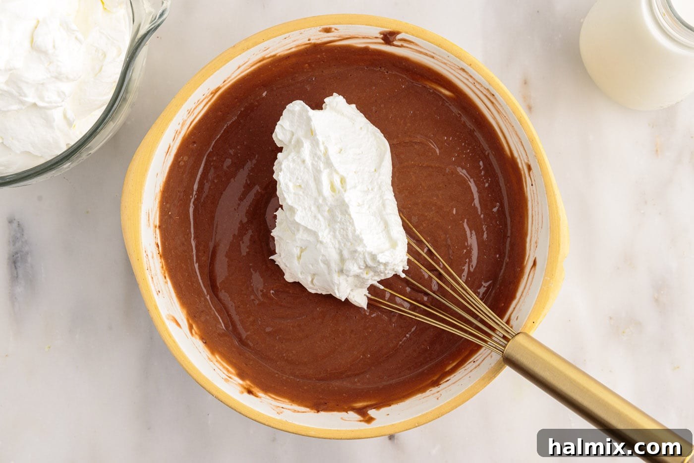 Ultimate Fudge Brownie Trifle 8 Gently folding whipped cream into the thickened chocolate pudding mixture