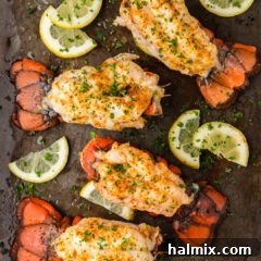 Overhead photo of Baked Lobster Tails on a baking sheet