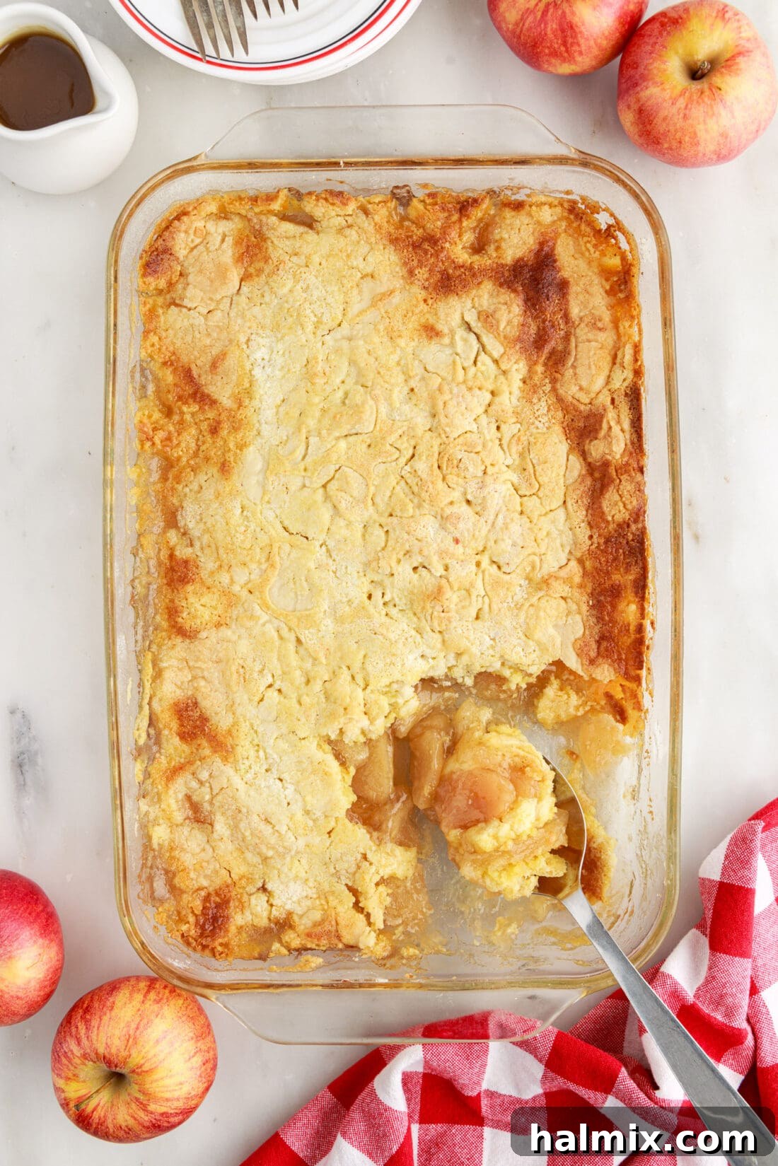 Pan of Apple Dump Cake with a spoon in it