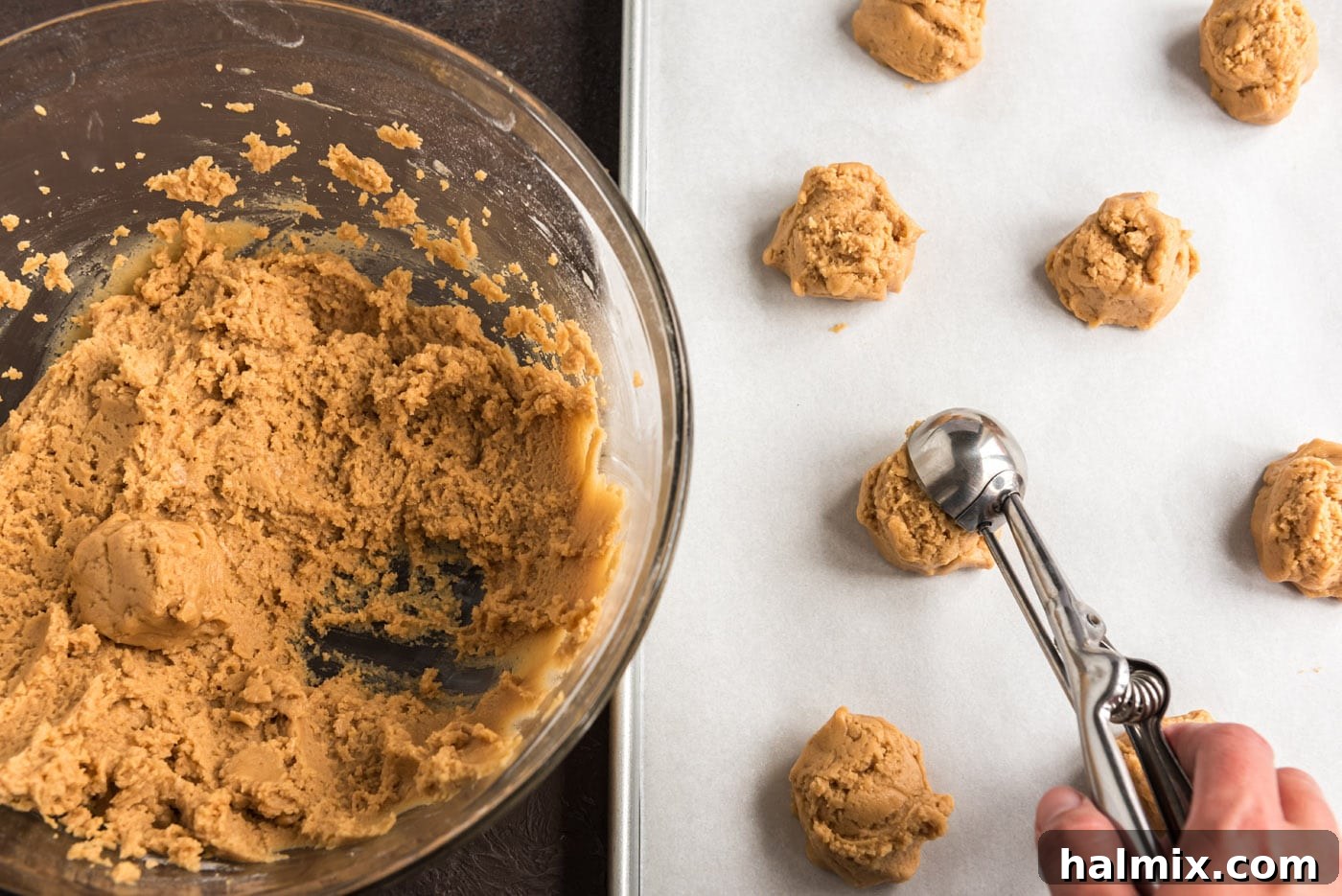 scooping cookie dough onto baking sheet
