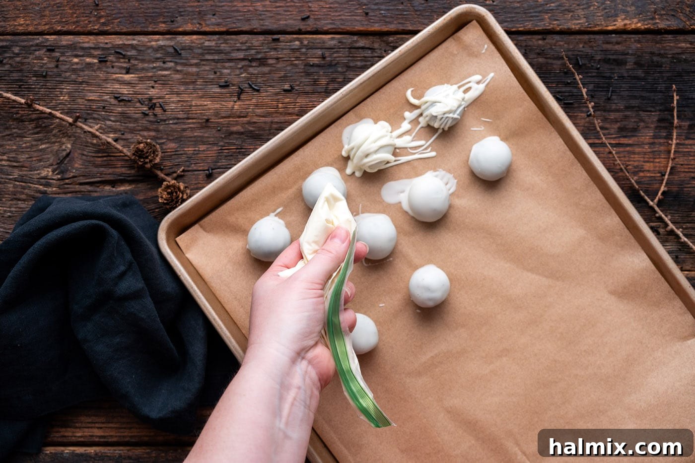 Hauntingly Delicious Oreo Truffles 11 drizzling white chocolate over oreo truffles