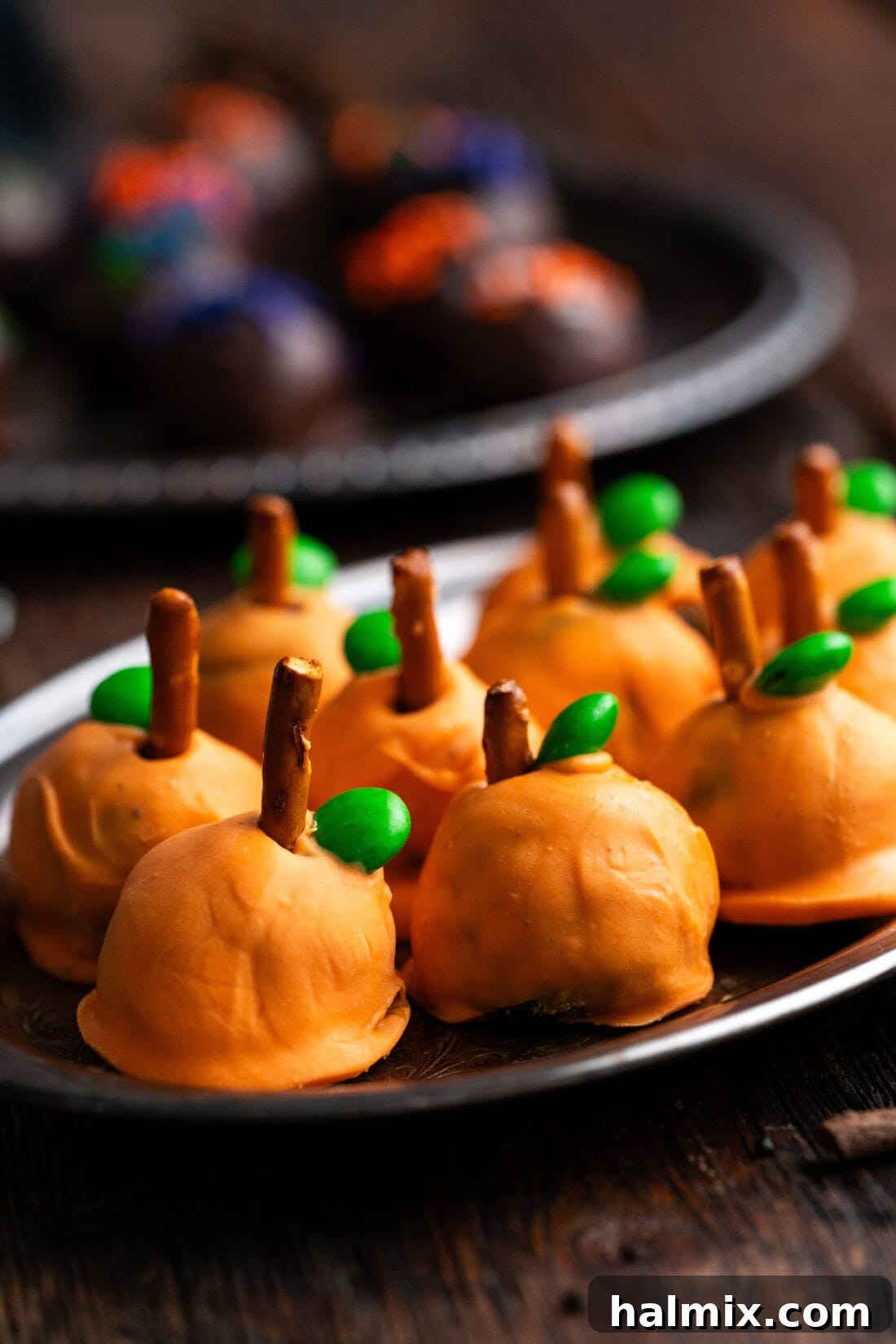 Hauntingly Delicious Oreo Truffles 3 Close up photo of pumpkin oreo truffles on a platter