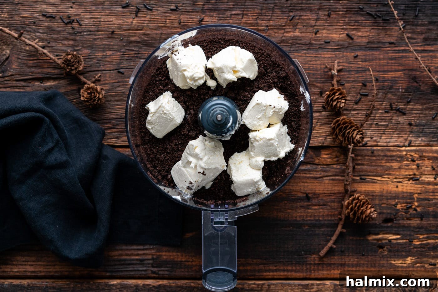 Hauntingly Delicious Oreo Truffles 6 cream cheese added to crushed oreo cookies in food processor