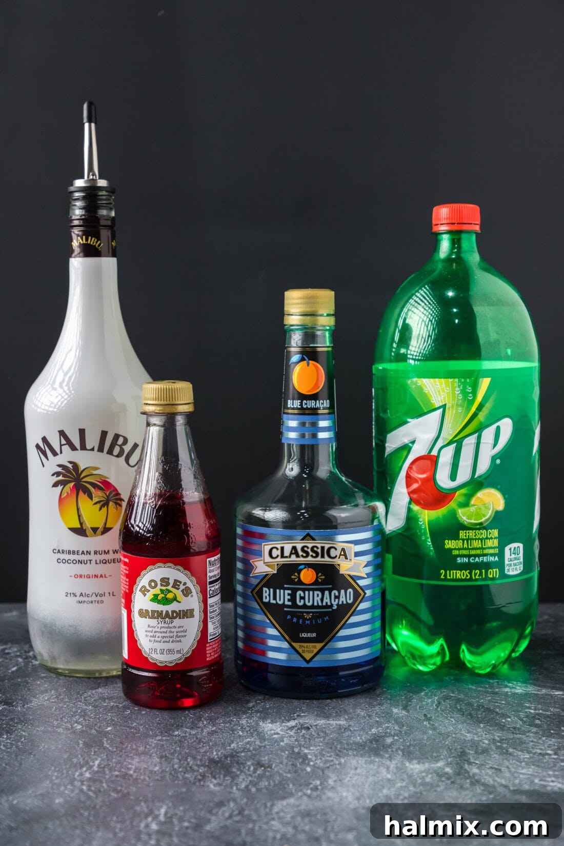 Purple Predator Potion 4 Ingredients for Purple People Eater Cocktail laid out