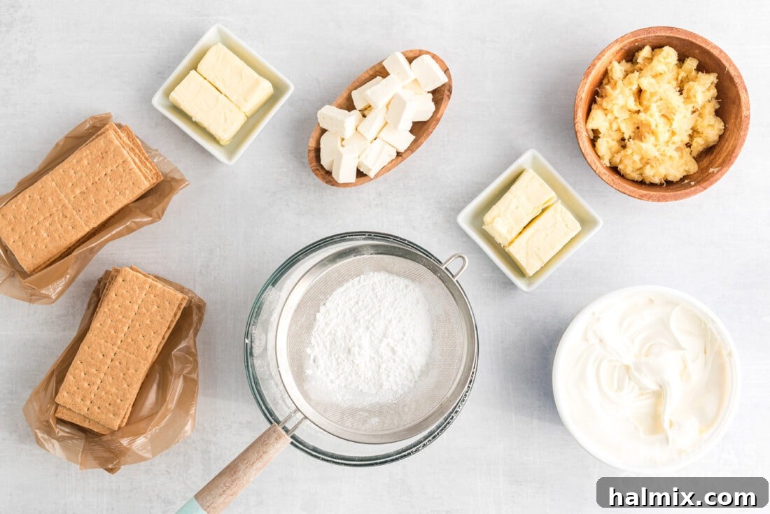 Tropical Pineapple Bliss 4 All the essential ingredients for Pineapple Dream Dessert laid out on a clean surface.