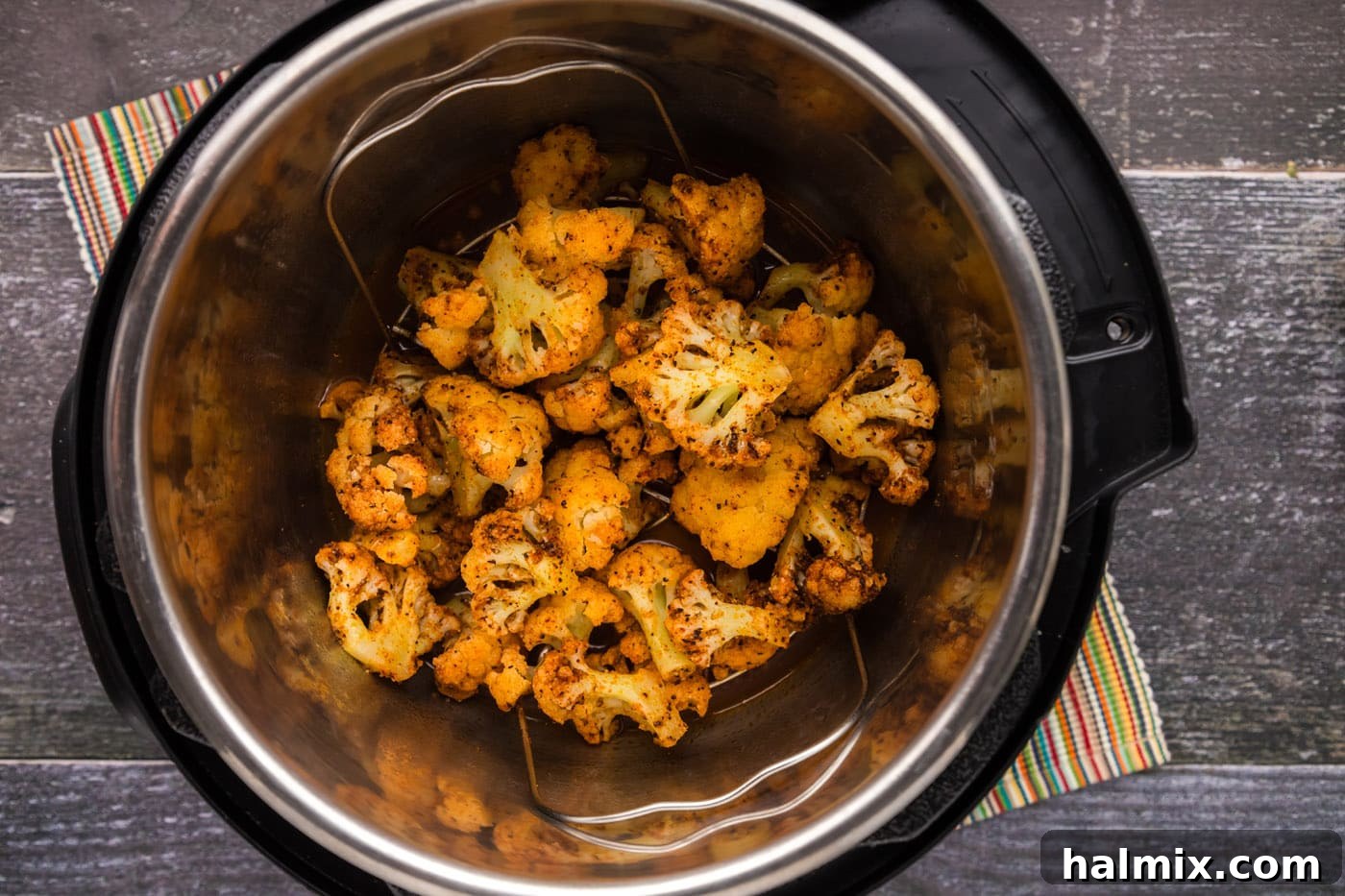 Effortless Instant Pot Cauliflower 9 The finished Instant Pot cauliflower, perfectly tender and seasoned, showcased in a bowl and ready to be served immediately after a quick release.