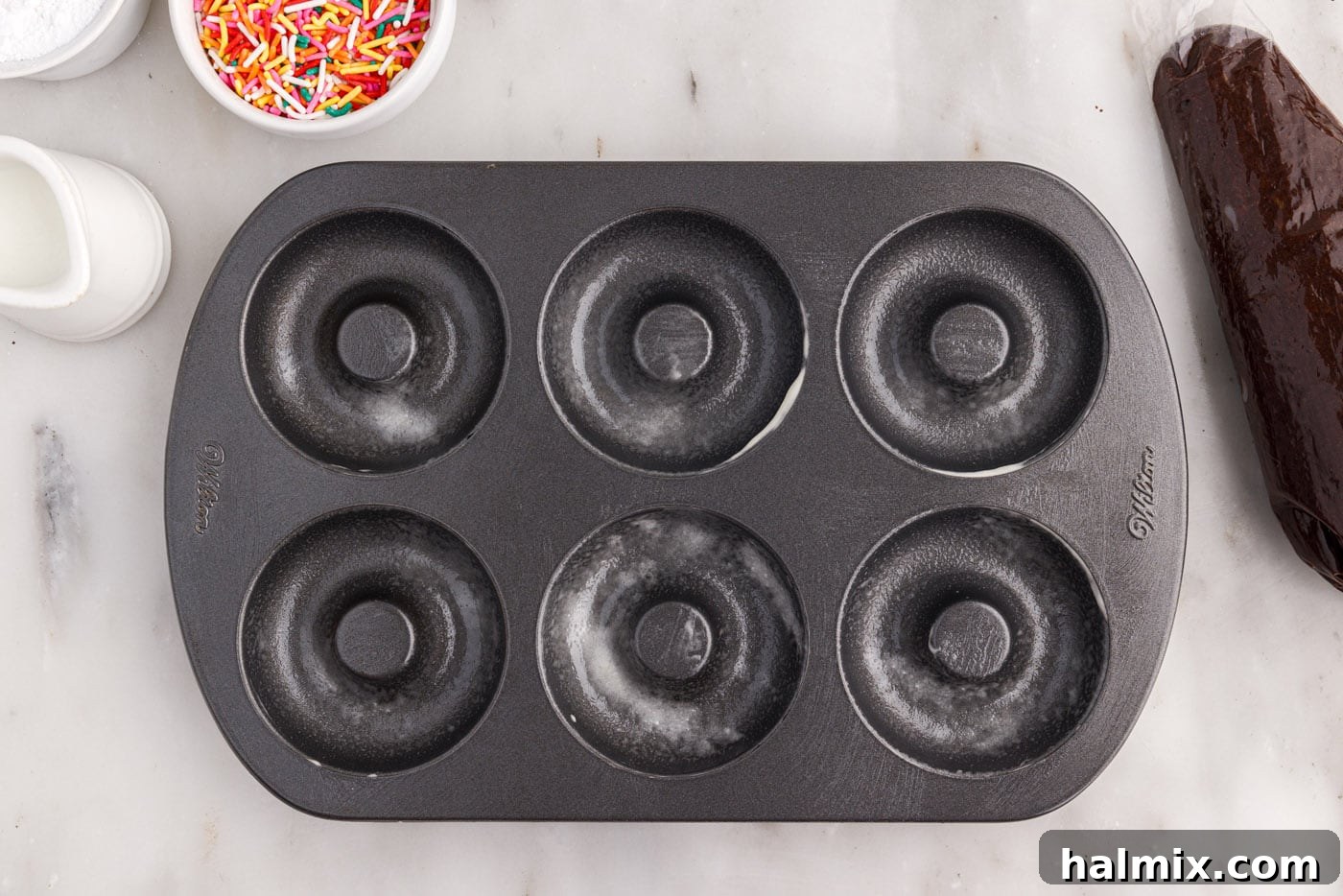 A baking pan sprayed with non-stick cooking spray with flour