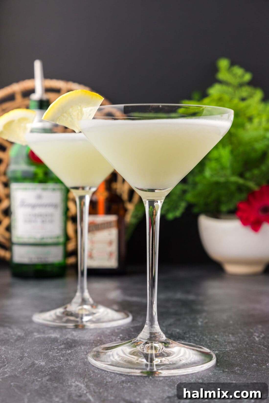 The Pale Belle 2 Two White Lady Cocktails garnished with a lemon wedge