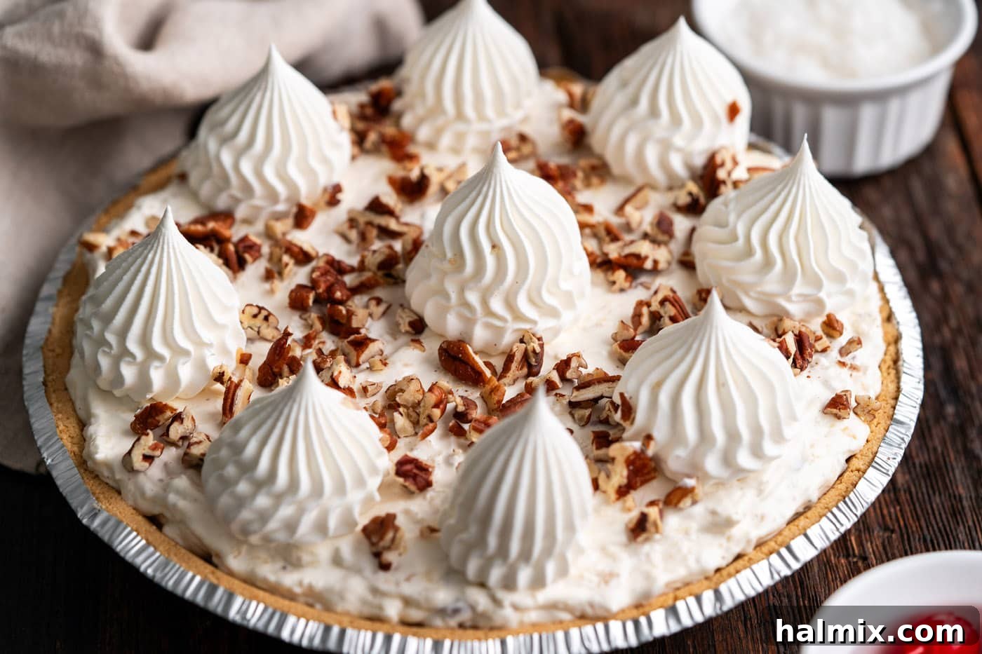piped cool whip rosettes on top of pie
