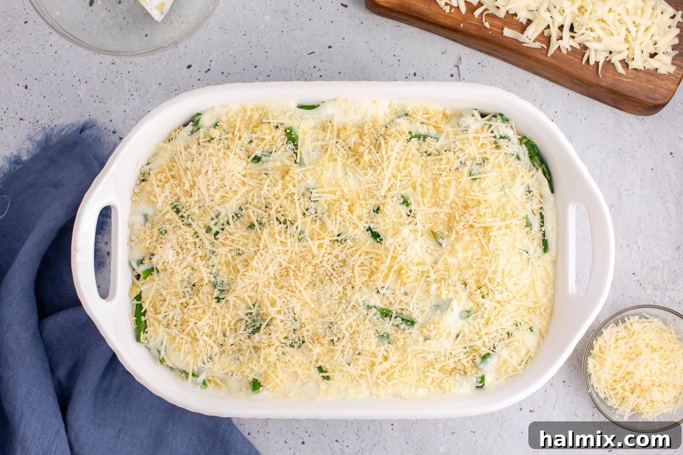 parmesan cheese and panko on top of asparagus casserole