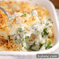 Close up photo of a spoonful of Asparagus Casserole