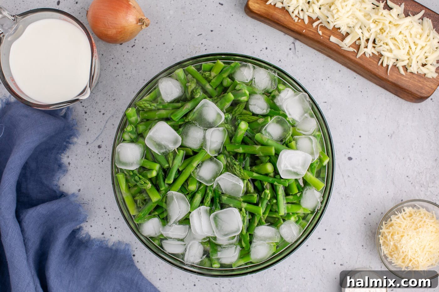 blanching asparagus in a bowl