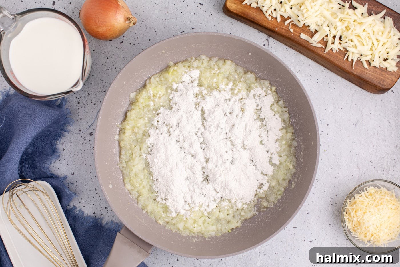 flour added to skillet iwth onion and garlic
