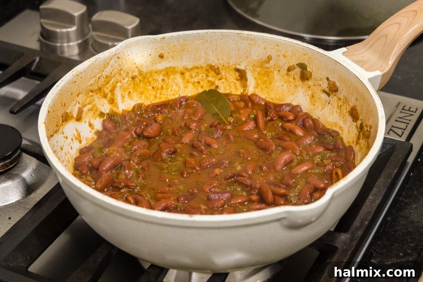 Bayou Red Beans and Rice Legacy 12 a close-up of the cooked red beans mixture, showing their tender, creamy texture and rich color