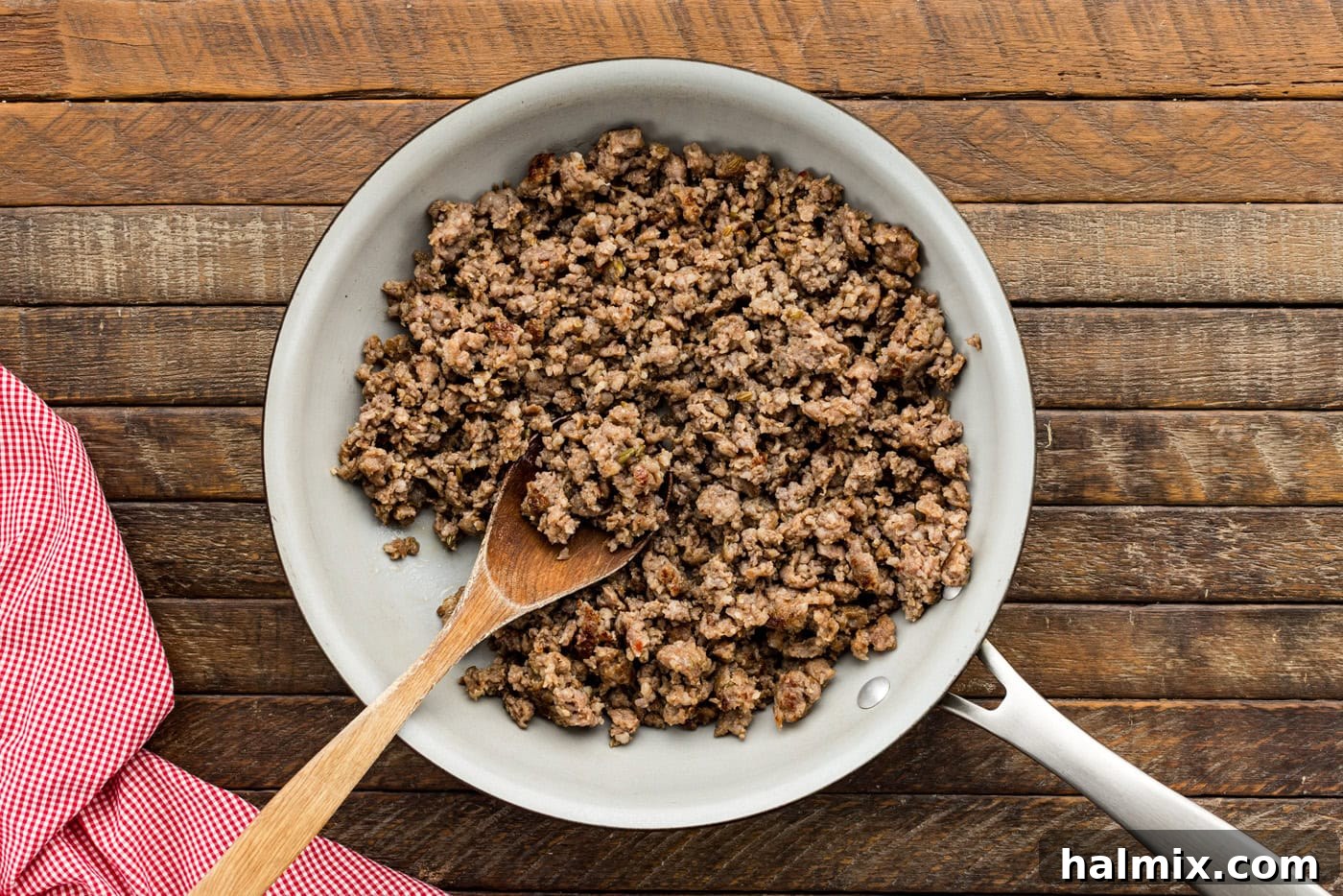 Cheesy Sausage Pepperoni Pizza Bake 5 cooked and crumbled italian sausage in a skillet