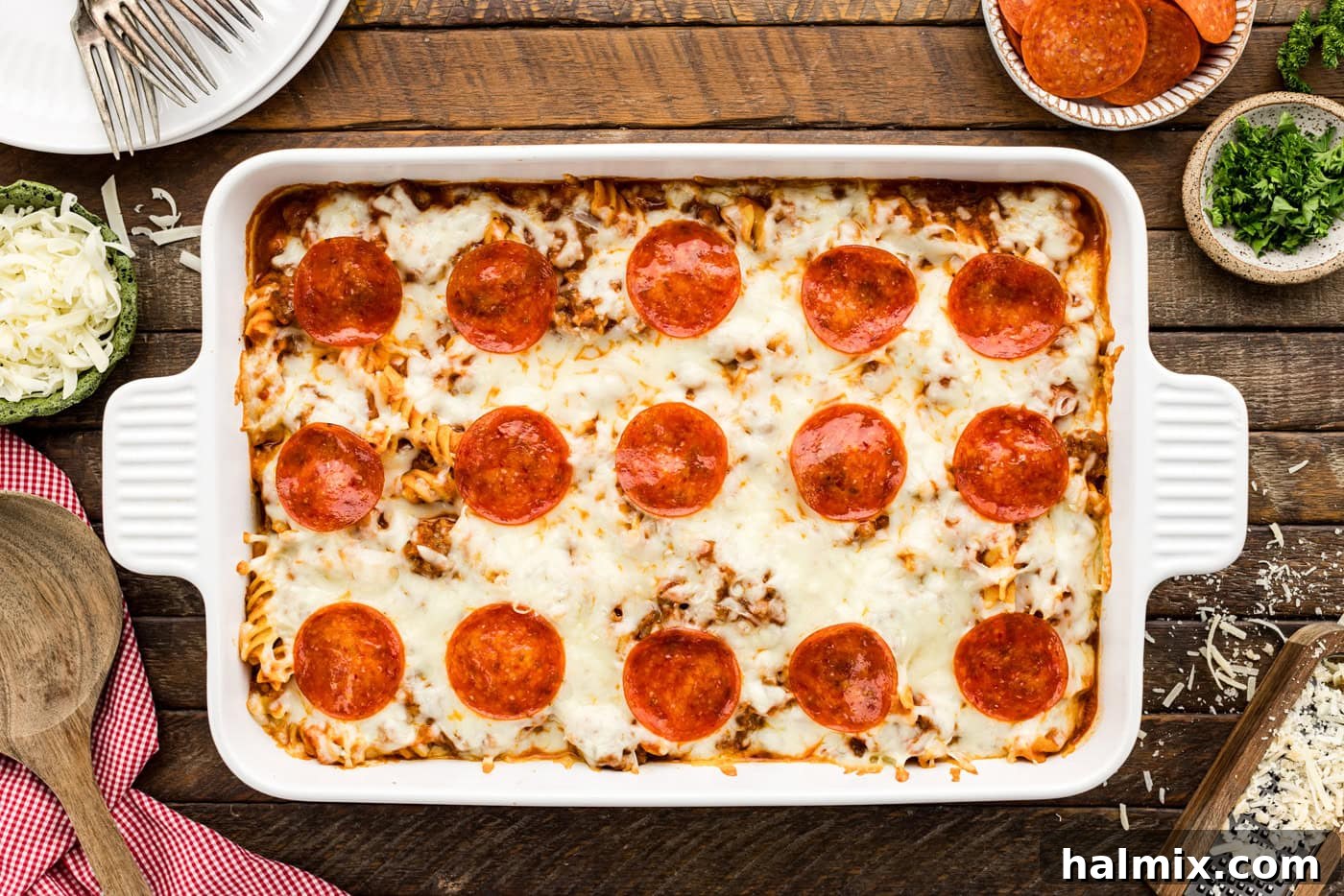 overhead of baked pizza casserole in a baking dish