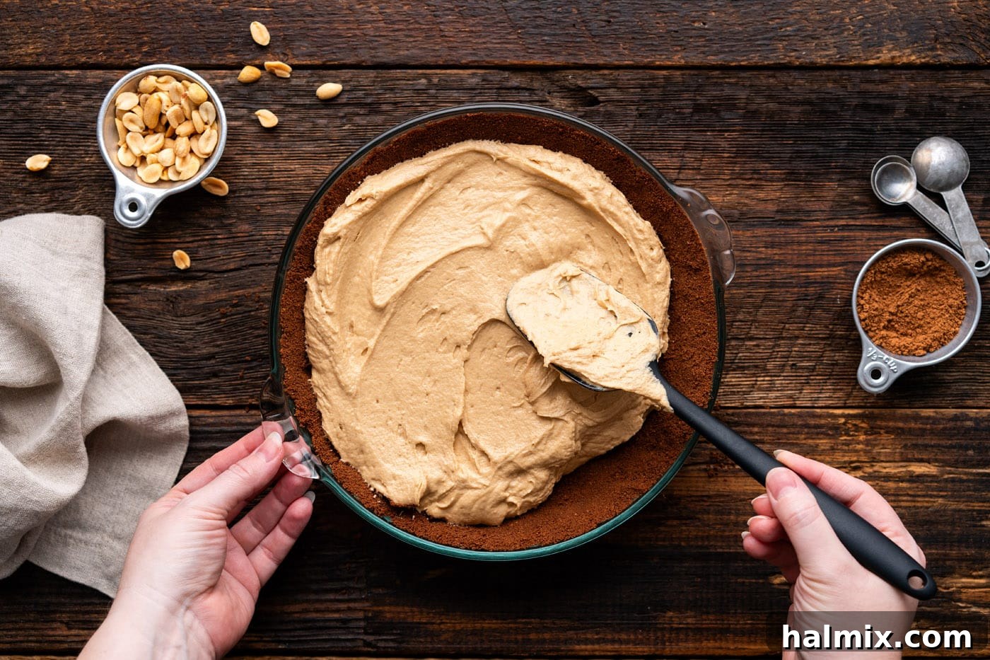 Chocolate Peanut Butter Bliss 11 spreading peanut butter pie filling over chocolate graham crust